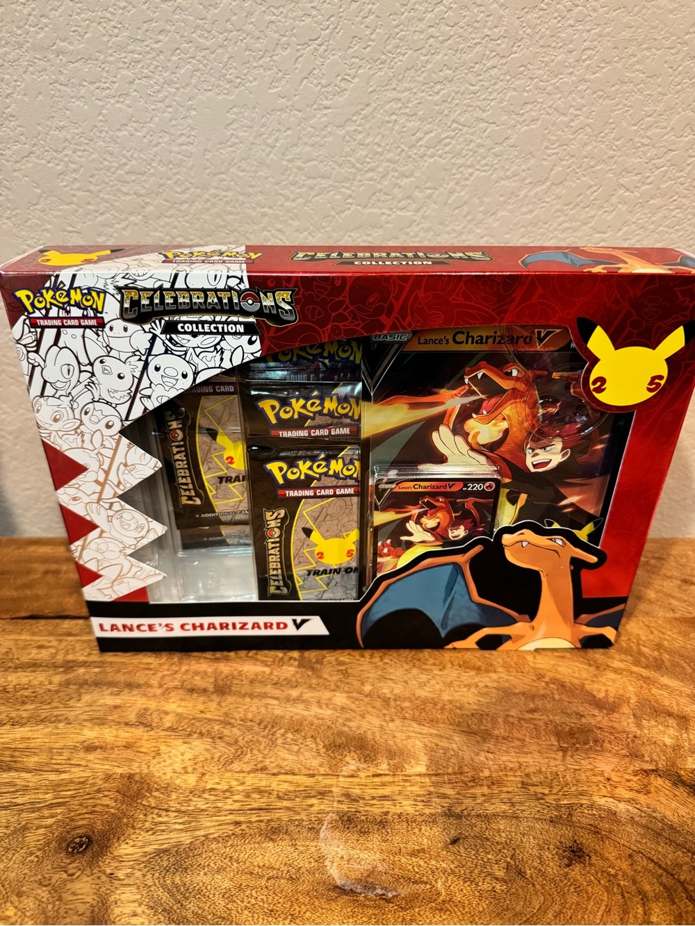 Pokémon 25th anniversary Celebrations Collection Lance's Charizard V - Red